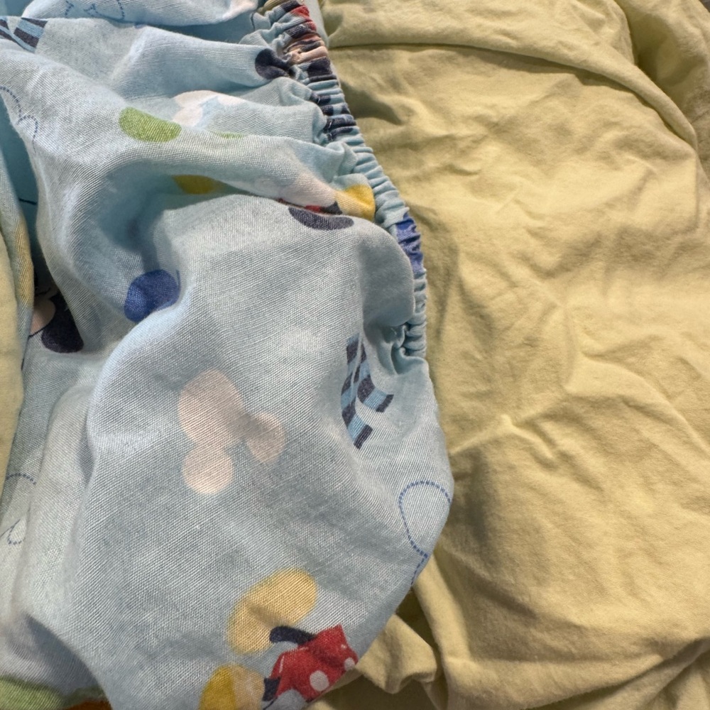 Crib sheets 3 and one mattress pad for the crib